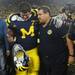 Michigan sophomore offensive lineman Taylor Lewan walks arm in arm with head coach Brady Hoke after Michigan beat Notre Dame 35-31 during the first-ever night game at Michigan Stadium on Saturday. Melanie Maxwell I AnnArbor.com